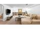 Finished basement with fireplace, built-ins, and plenty of room for entertaining at 628 Cherry St, Denver, CO 80220
