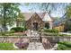 Charming brick home with landscaped garden and inviting front entrance at 628 Cherry St, Denver, CO 80220