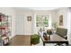 Office space featuring hardwood floors, a large window, and neutral paint at 628 Cherry St, Denver, CO 80220