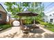 A patio with outdoor seating and a grill, perfect for entertaining at 628 Cherry St, Denver, CO 80220