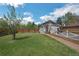 Backyard features large manicured lawn and privacy fence at 7340 W 32Nd Ave, Wheat Ridge, CO 80033