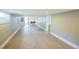 Spacious open basement area with wood-look floors, recessed lighting, and kitchenette at 7340 W 32Nd Ave, Wheat Ridge, CO 80033