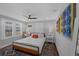 Bedroom with hardwood floors, modern decor, and bright natural light at 7340 W 32Nd Ave, Wheat Ridge, CO 80033