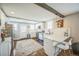 Modern kitchen featuring white cabinets and quartz countertops at 7340 W 32Nd Ave, Wheat Ridge, CO 80033