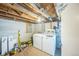 Basement laundry area with washer and dryer hookups at 7340 W 32Nd Ave, Wheat Ridge, CO 80033