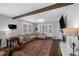 Spacious living area with hardwood floors and a fireplace at 7340 W 32Nd Ave, Wheat Ridge, CO 80033