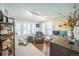 Comfortable office space with a recliner, natural light, and hardwood floors at 7340 W 32Nd Ave, Wheat Ridge, CO 80033