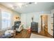Office with dual monitors, hardwood floors, and built in storage at 7340 W 32Nd Ave, Wheat Ridge, CO 80033