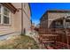 View of the home's garden area with planting beds and privacy fence at 7514 Blue Water Dr, Castle Rock, CO 80108