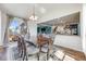Dining room with a view to the back yard and a passthrough to the kitchen area at 7514 Blue Water Dr, Castle Rock, CO 80108