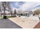 Open backyard area featuring a patio, landscaping, and potential for outdoor enjoyment at 4164 W Eldorado Pl, Denver, CO 80236