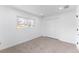 Bright bedroom with large window and closet, providing ample natural light and storage at 4164 W Eldorado Pl, Denver, CO 80236