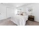 Cozy bedroom with ample natural light, neutral colors, and comfortable carpeting offers a peaceful retreat at 4164 W Eldorado Pl, Denver, CO 80236