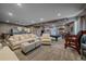 Spacious finished basement with a wet bar, pool table, and comfortable seating area, perfect for entertaining at 1901 Corner Rock Ln, Castle Rock, CO 80108