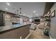 Finished basement featuring a wet bar, a TV, and casual seating at 1901 Corner Rock Ln, Castle Rock, CO 80108