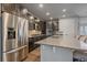 Modern kitchen with stainless steel appliances and granite counters at 1901 Corner Rock Ln, Castle Rock, CO 80108