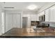 Modern kitchen with stainless steel appliances, updated cabinets, and sleek countertops at 832 S Vance St # F, Lakewood, CO 80226