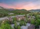 Aerial view of 33 Broken Lance Drive #207S with mountain views and lush greenery in the background at 33 Broken Lance Dr # 207S, Breckenridge, CO 80424