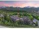 Stunning condo complex with mountain views, lush landscaping, and nearby forest for a serene escape at 33 Broken Lance Dr # 207S, Breckenridge, CO 80424