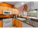 Kitchen featuring granite countertops, stainless appliances, and eat-in bar with seating at 33 Broken Lance Dr # 207S, Breckenridge, CO 80424