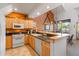 Kitchen featuring granite countertops, stainless appliances, and eat-in bar with seating at 33 Broken Lance Dr # 207S, Breckenridge, CO 80424