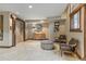 Lobby featuring comfortable chairs, stone flooring, and elevator access, with a rustic mountain aesthetic at 33 Broken Lance Dr # 207S, Breckenridge, CO 80424