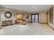 Inviting lobby with stylish seating, elegant decor, and stone flooring, perfect for receiving guests at 33 Broken Lance Dr # 207S, Breckenridge, CO 80424