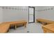 Clean and relaxing sauna room with wooden benches and tiled walls and floors at 33 Broken Lance Dr # 207S, Breckenridge, CO 80424