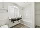 Modern bathroom with dual sinks and stylish fixtures at 180 W 78Th Pl, Denver, CO 80221