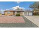 Charming single-story home with brick and siding, a well-manicured lawn, and a two-car garage at 180 W 78Th Pl, Denver, CO 80221