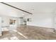 Open living room boasts tile floors and access to the outdoor space at 180 W 78Th Pl, Denver, CO 80221
