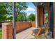 Inviting outdoor seating area with stylish chairs, perfect for relaxing and enjoying the neighborhood view at 2244 S Lincoln St, Denver, CO 80210