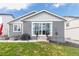 Nice backyard with an outdoor seating area, barbecue grill, and convenient access to the house at 2578 Gray Wolf Pl, Castle Rock, CO 80104