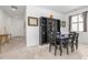 Traditional dining room with dark wood furniture and decorative shelving at 2578 Gray Wolf Pl, Castle Rock, CO 80104