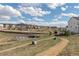 A view of neighborhood walking paths, landscaping, and stormwater retention at 2578 Gray Wolf Pl, Castle Rock, CO 80104