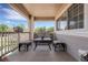 Cozy outdoor seating area with views of mature trees and landscape at 4251 S Blackhawk Cir # 3E, Aurora, CO 80014
