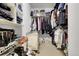 Walk-in closet with custom shelving, maximizing space for organized storage at 4251 S Blackhawk Cir # 3E, Aurora, CO 80014