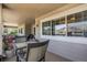 Spacious covered patio featuring comfortable seating, plants and outdoor living space at 4251 S Blackhawk Cir # 3E, Aurora, CO 80014