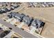 Aerial view showcasing the neighborhood, manicured lawns, and thoughtfully designed community at 671 Green Mountain Dr, Erie, CO 80516