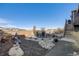 A peaceful backyard retreat with unique landscaping, seating, and a serene atmosphere at 671 Green Mountain Dr, Erie, CO 80516