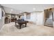 Finished basement featuring a pool table, bar, stairs to the main level, and recessed lighting at 671 Green Mountain Dr, Erie, CO 80516
