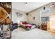 A cozy bedroom showcases a window with neighborhood views at 671 Green Mountain Dr, Erie, CO 80516