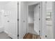 Hallway with a view to a bathroom and bedroom at 8603 Barberry Pl, Parker, CO 80134