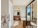 Bright bathroom with dual vanity, soaking tub, walk-in shower, and tasteful design at 23713 E Eads Dr, Aurora, CO 80016