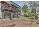 Spacious backyard with a shed, patio area, and a two-level deck perfect for outdoor living at 5316 S Rome St, Aurora, CO 80015