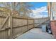 Fenced backyard features a concrete patio with room for outdoor seating and entertaining at 3685 W Union Ave, Denver, CO 80236