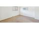 This bedroom features neutral carpet, a window with blinds, and is freshly painted at 3685 W Union Ave, Denver, CO 80236