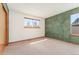 Spacious bedroom offers natural light from two windows and neutral carpet at 7313 W 98Th Pl, Broomfield, CO 80021