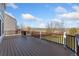 Spacious deck overlooking landscaped backyard and mountain views at 7313 W 98Th Pl, Broomfield, CO 80021