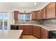 This kitchen features great natural light and opens to views of the yard at 7313 W 98Th Pl, Broomfield, CO 80021